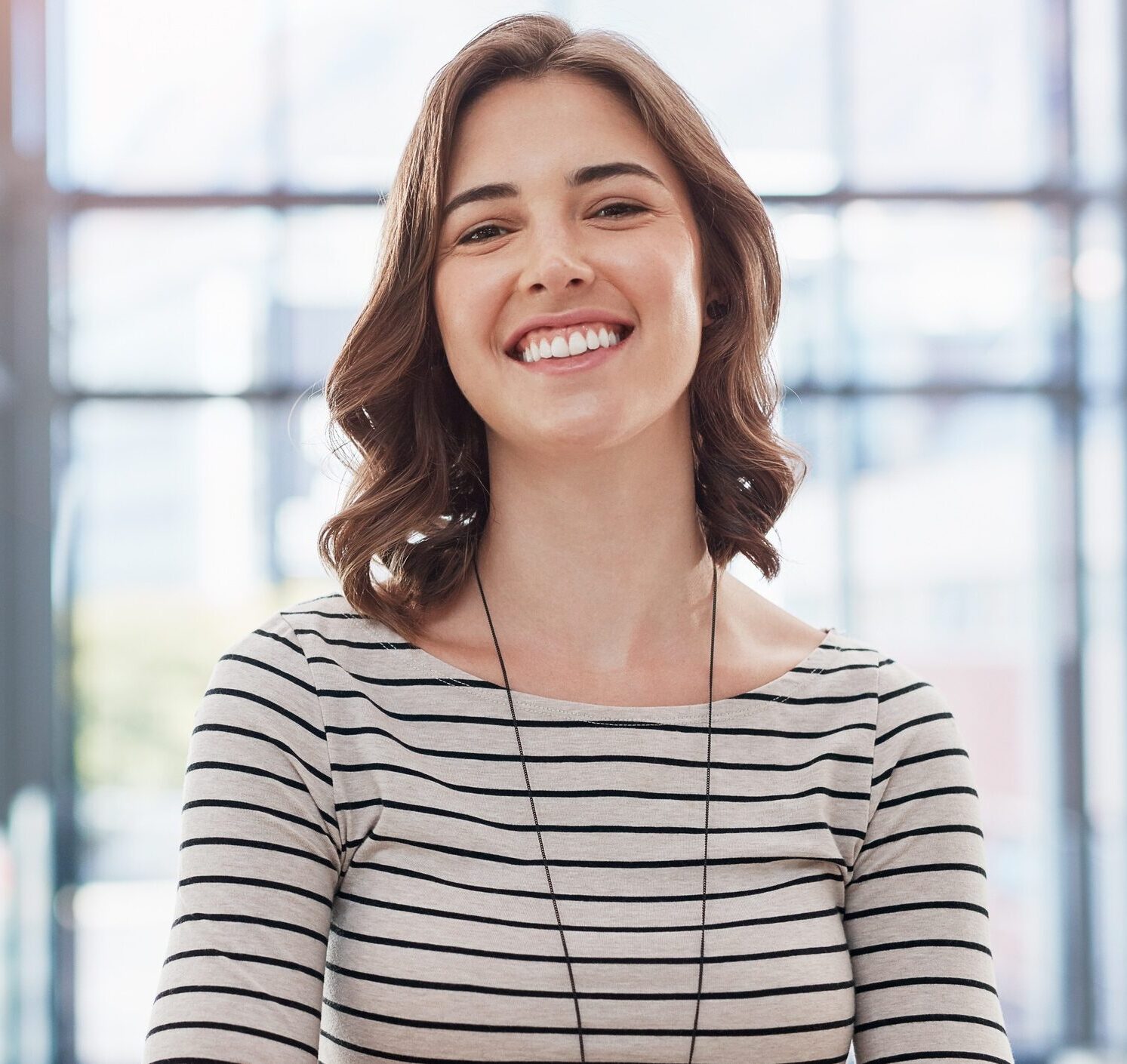 Portrait of a confident businesswoman working in an office